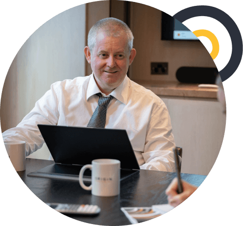 SMSF adviser in Perth looking at a laptop